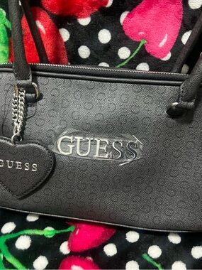 GUESS Black Logo Shoulder Bag with Heart Charm Accent